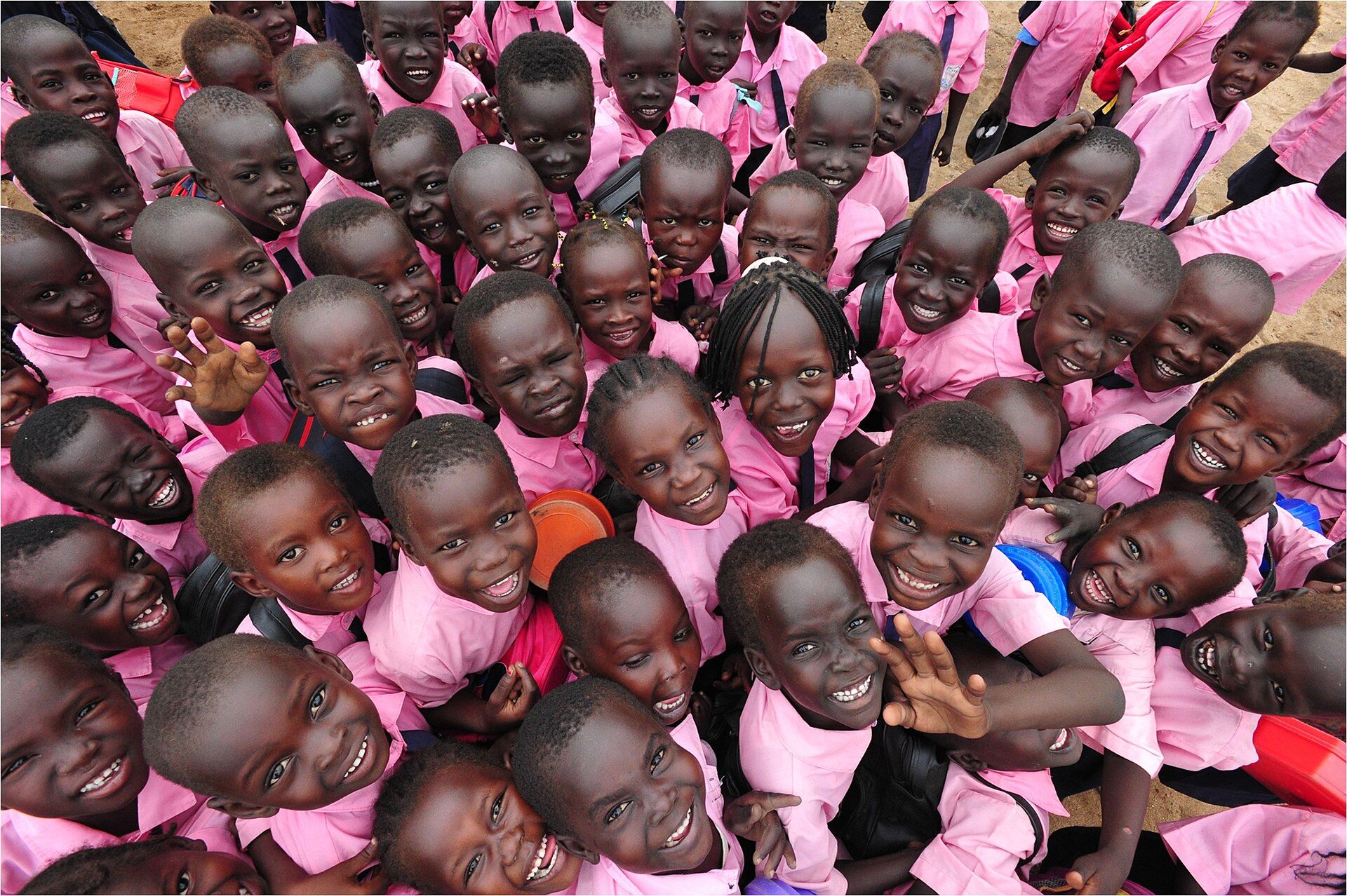 Schoolchildren in South Sudan smiling together