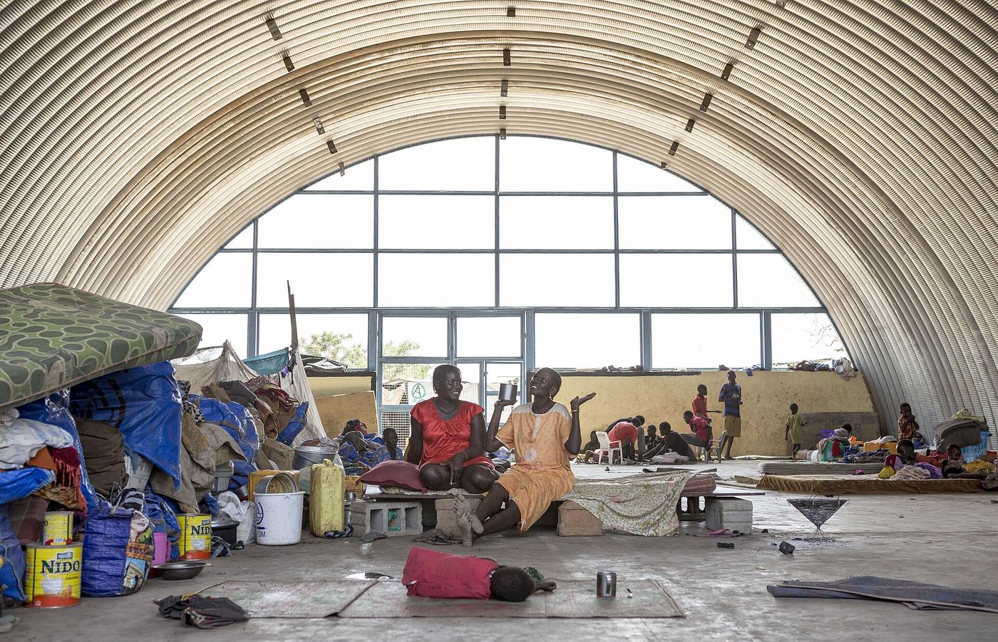 Displaced families sheltering at the UN House camp in Juba