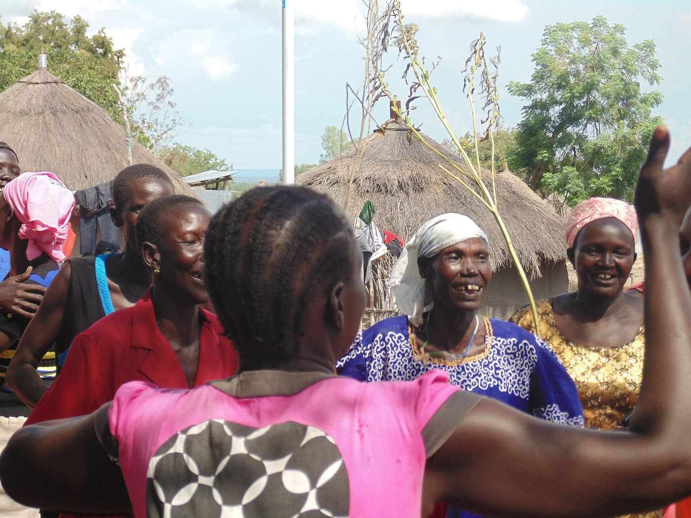 A community meeting with a speaker addressing the group