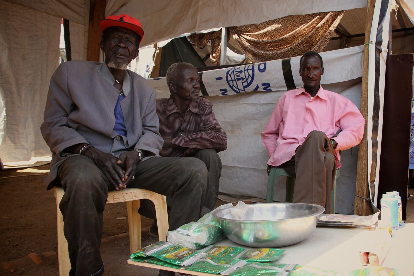 Community members gathered in discussion in Juba