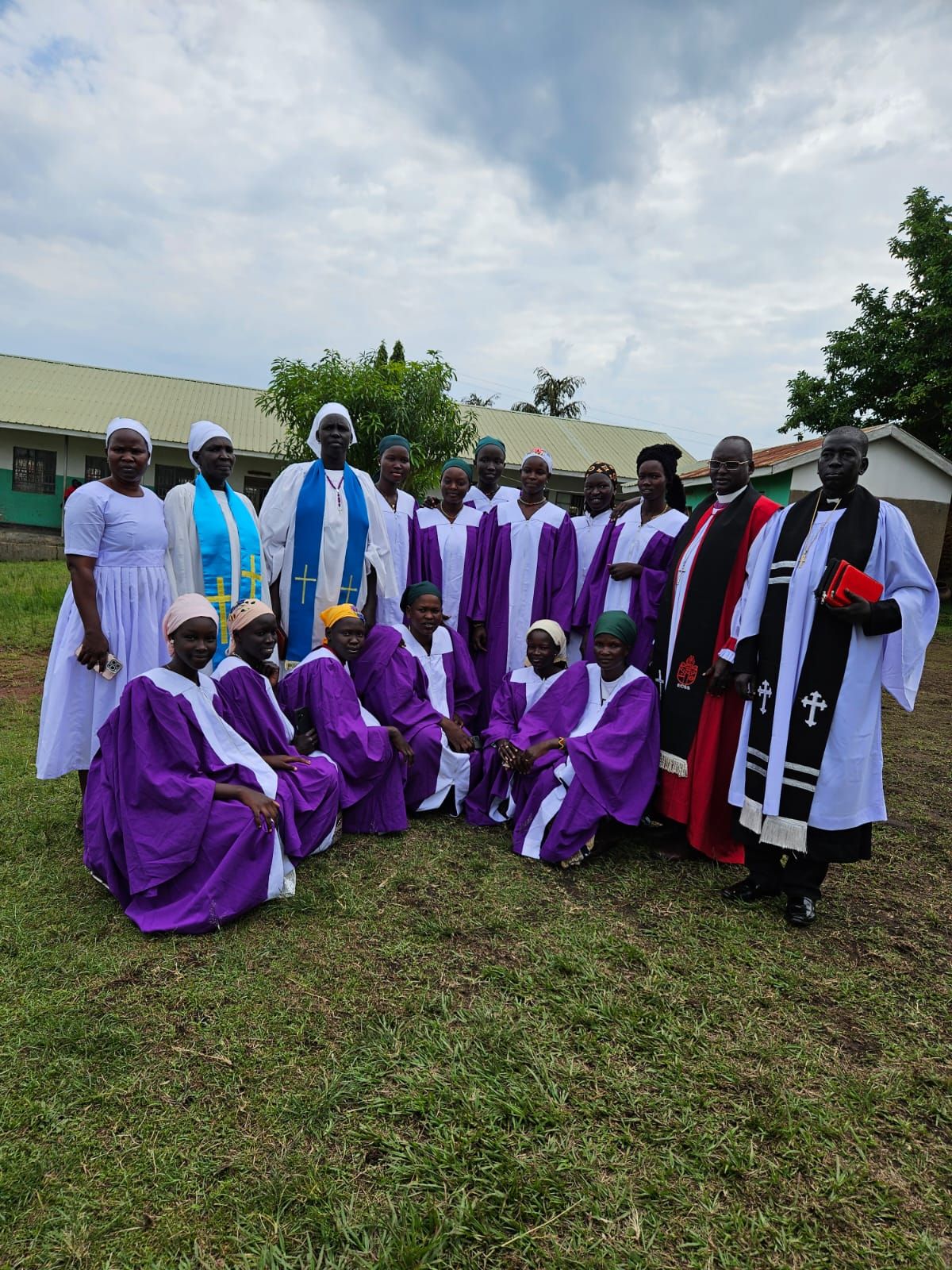 Choir members and clergy after a dedication service