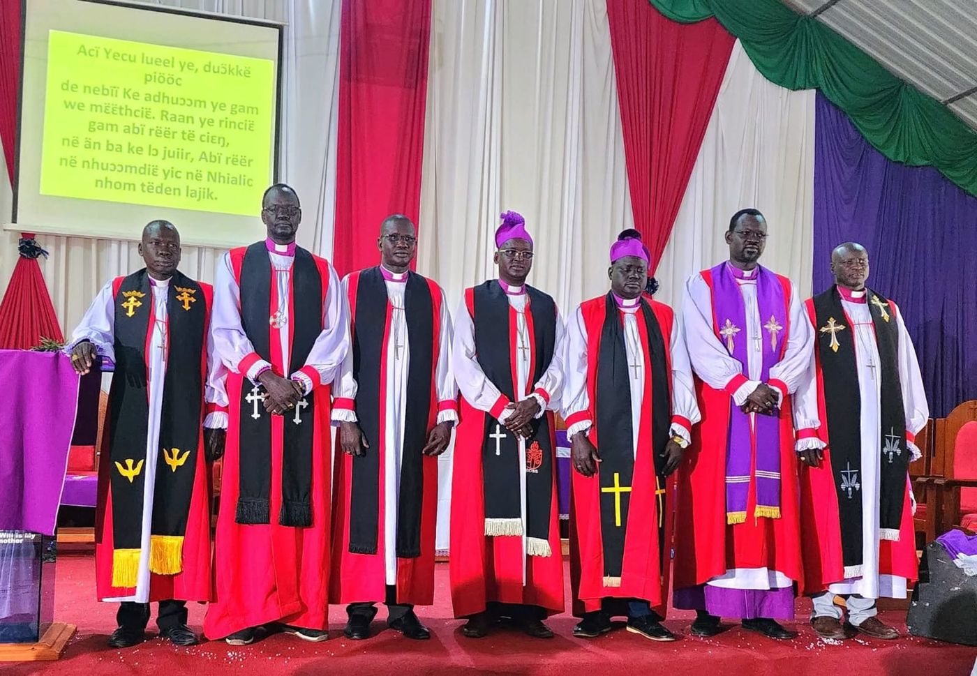 Bishops standing together during a service